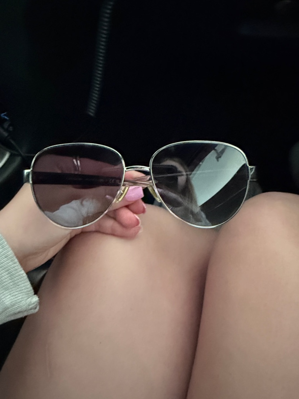 Coach Silver Frame Sunglasses with Pink-Tinted Lenses
